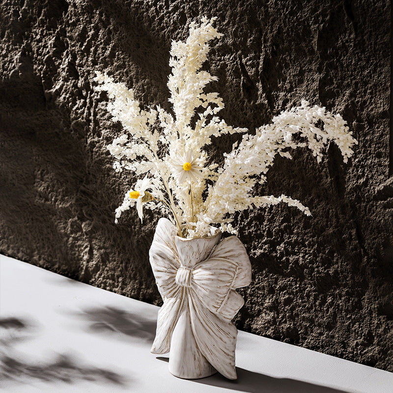 Sculptural ceramic flower vase on modern tabletop aesthetic interior styling