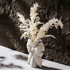Sculptural ceramic flower vase on modern tabletop aesthetic interior styling