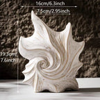 Modern white shell-shaped ceramic vase with sculptural spiral texture for coastal home decor with size