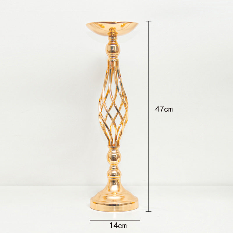 Gold candle holder with dimensions on a white background