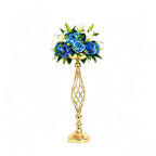 Gold candle holder with blue flowers on a white background